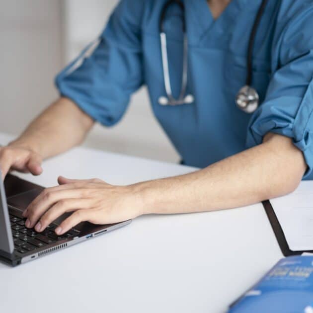 Doctor of Philosophy in Nursing (Nursing Administration) doctor-doing-their-work-pediatrics-office