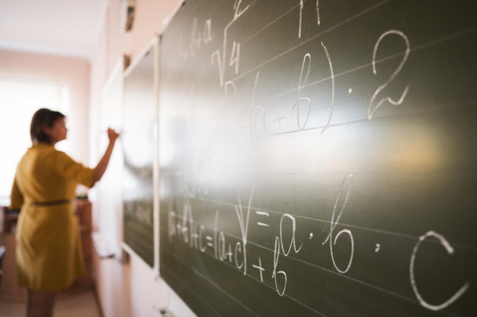Master of Arts in Teaching (English, Mathematics, Filipino, Biology, Chemistry, Social Studies) portrait-teacher-writing-chalkboard